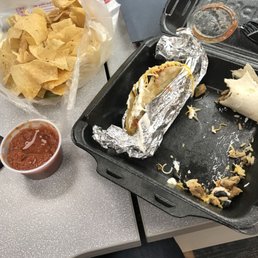 a burrito and chips on a tray a burrito and chips on a tray