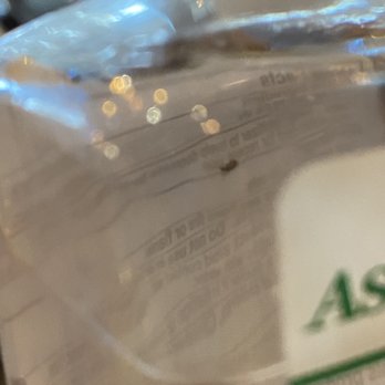 Sakebomb - Bug in hand sanitizer bottle at our table - Sushi Bars Near Me - Sunnyvale, California