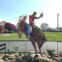 McDonald's - Animated cowboy metal sculpture in front of McD's.