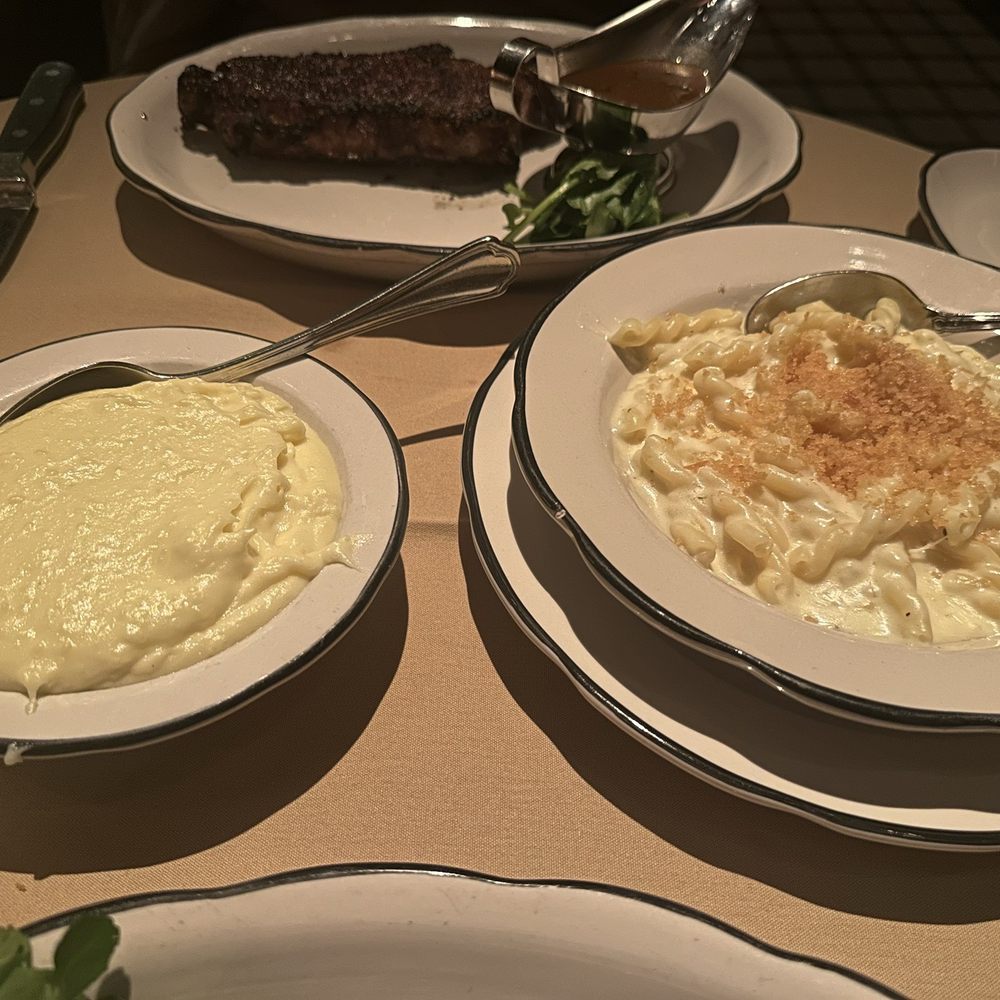 Left - Mashed Potatoes, Right - Mac N Cheese Back Middle - New York Strip