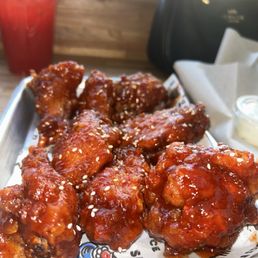 Wings (8 pcs) with K sauce Wings (8 pcs) with K sauce