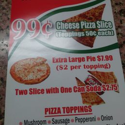 Storefront advertisement a slice 99 Cents really not bad. Storefront advertisement a slice 99 Cents really not bad.