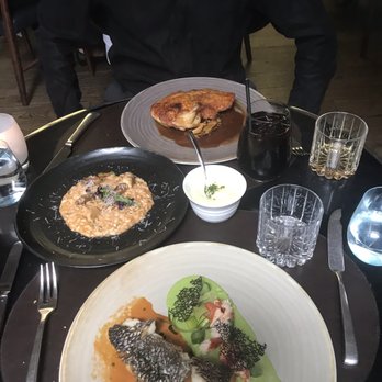 Spago - Crispy Black seabass with lobster, mushroom risotto, and chicken. - New American Near Me - Beverly Hills, California Spago - Crispy Black seabass with lobster, mushroom risotto, and chicken. - New American Near Me - Beverly Hills, California