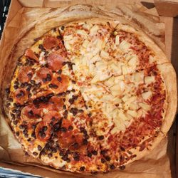 Mr Gatti's Pizza - Does this look like a hamburger pizza all over with pepperoni and pineapple on the right.