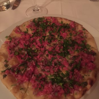 Snake River Grill - Steak carpaccio pizza... Really delish but if you don't like onions you will not like this! - New American Near Me - Jackson, Wyoming Snake River Grill - Steak carpaccio pizza... Really delish but if you don't like onions you will not like this! - New American Near Me - Jackson, Wyoming