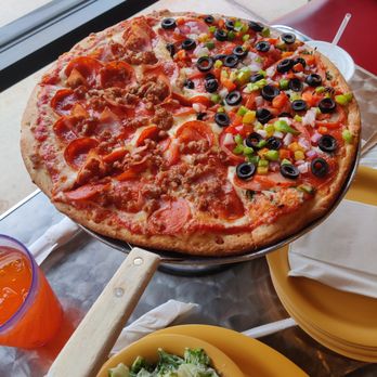 Locatelli's - Customized pizza; variation of Carnatelli & Stuffatelli - Pizza Near Me - Cypress, Texas