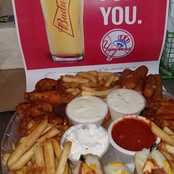Maxwell's Pub - a platter of hot dogs and french fries - American Near Me - Elmsford, New York