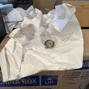 Roadway Moving - Unbreakable item wrapped in excessive amount of paper - Movers Near Me - Northridge, California Roadway Moving - Unbreakable item wrapped in excessive amount of paper - Movers Near Me - Northridge, California