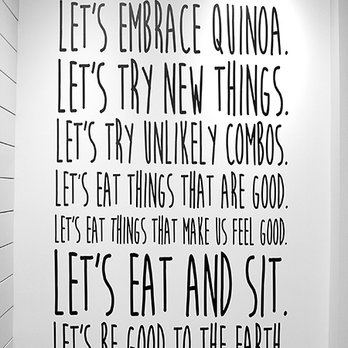 Freshii - a black and white photograph of a wall with a quote on it - Vegan Near Me - Lethbridge, Alberta