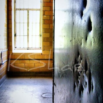 Trans-Allegheny Lunatic Asylum - The indentations you see on the door, were made by a patient when locked inside this seclusion room - Landmarks & Historical Buildings Near Me - Weston, West Virginia Trans-Allegheny Lunatic Asylum - The indentations you see on the door, were made by a patient when locked inside this seclusion room - Landmarks & Historical Buildings Near Me - Weston, West Virginia