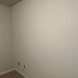 PatchMaster - After. The lighter color on the wall is a light effect. Flawless. Not even painted. Luis matched the texture to the paint. - Drywall Installation & Repair Near Me - Portland, Oregon