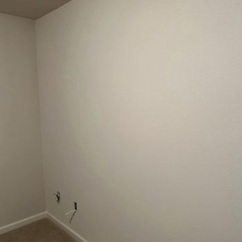 PatchMaster - After. The lighter color on the wall is a light effect. Flawless. Not even painted. Luis matched the texture to the paint. - Drywall Installation & Repair Near Me