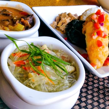 Ama Ama Restaurant - "LOCAL LUNCH PLATE" Lau Lau, Tempura Local Fish, Ahi Poke, Rice, Mac, and along with bowls of Beef Stew and Chicken Long Rice. - New American Near Me - Kapolei, Hawaii