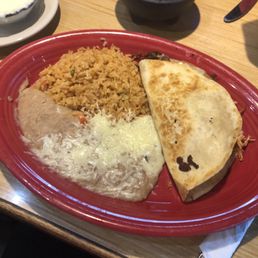 Grilled chicken quesadilla with rice and beans. Grilled chicken quesadilla with rice and beans.