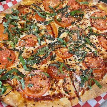 Davanza's - Margherita Pizza with extra fresh basil - Pizza Near Me - Park City, Utah Davanza's - Margherita Pizza with extra fresh basil - Pizza Near Me - Park City, Utah