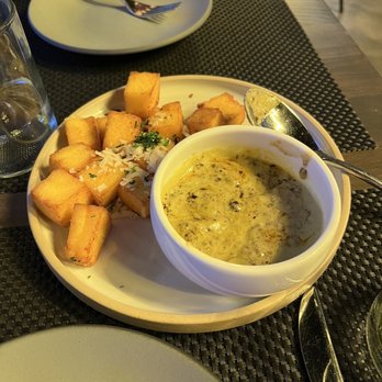 WHINO - Cheesy polenta tempertots & queso fundido with chorizo - Tapas/Small Plates Near Me - Arlington, Virginia WHINO - Cheesy polenta tempertots & queso fundido with chorizo - Tapas/Small Plates Near Me - Arlington, Virginia