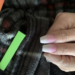 Uneven, slanted and shorter.