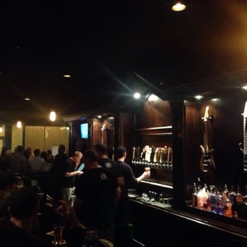 Heavy Riff Brewing - Guitars and craft beer taps line the busy bar - Breweries Near Me - Saint Louis, Missouri