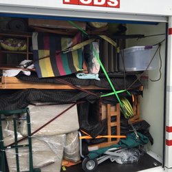 Affordable Movers - Heavily packed 16' POD carefully transferred to a 28' trailer in two hours!