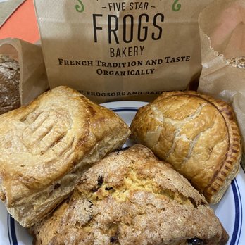Frogs Organic Bakery - Rectangular guava, triangle cranberry orange scone, half-moon shaped apple turnover, and bags with croissants. - Bakeries Near Me - Gardena, California