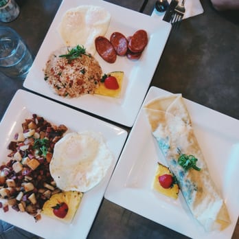Moena Café - Corned Beef Hash; Sundried Tomato, Spinach, Cream Cheese Crepe; Fried Rice, Eggs, and Sausage - Cafes Near Me - Honolulu, Hawaii Moena Café - Corned Beef Hash; Sundried Tomato, Spinach, Cream Cheese Crepe; Fried Rice, Eggs, and Sausage - Cafes Near Me - Honolulu, Hawaii