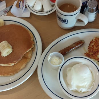 IHOP - Banana pancakes, poached eggs, hashbrowns and sausage links at IHOP - American Near Me - Virginia Beach, Virginia