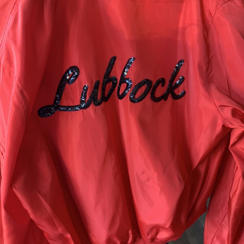 Hemline - Adorable red jacket with Lubbock on the back! Unique! - Accessories Near Me - Lubbock, Texas