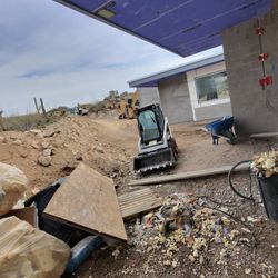 Octopus Hauling and Junk Removal - Site cleanup mini bobcat s70