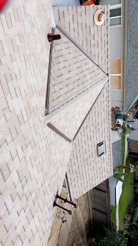 Slide of K-9 Custom Roofing