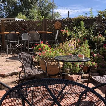 Cucuru Gallery Cafe - a patio with chairs and tables - Cafes Near Me - Colorado Springs, Colorado Cucuru Gallery Cafe - a patio with chairs and tables - Cafes Near Me - Colorado Springs, Colorado