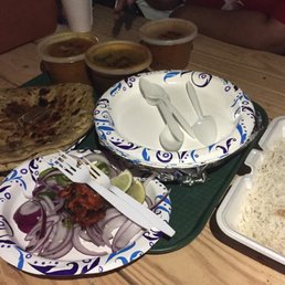 Dhaba outdoor patio - aloo paratha, Jeera rice, goat curry, chicken curry, saag paneer, and paneer masala Dhaba outdoor patio - aloo paratha, Jeera rice, goat curry, chicken curry, saag paneer, and paneer masala