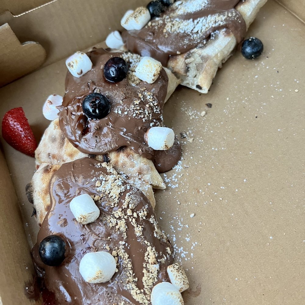Posto Pizza - Dessert... Nutella, berries, marshmallows and brown sugar. Can't go wrong! Delicious! - Pizza Near Me - Celebration, Florida Posto Pizza - Dessert... Nutella, berries, marshmallows and brown sugar. Can't go wrong! Delicious! - Pizza Near Me - Celebration, Florida