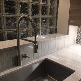 Unacceptable faucet clearance.