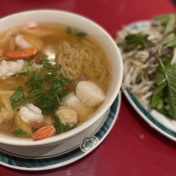 Saigon Palace - a bowl of soup and a plate of salad - Vietnamese Near Me - Charlotte, North Carolina Saigon Palace - a bowl of soup and a plate of salad - Vietnamese Near Me - Charlotte, North Carolina