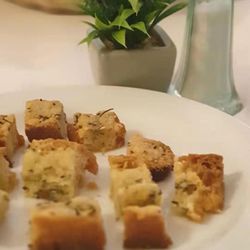Trattoria Rondine - Toasted breadcrumbs topped with rosemary and cheese