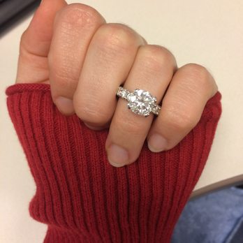 Lavdas Jewelers - My beautiful custom made ring by Lavdas Jewelers. 2 ct in the center and 1ct around the band. 18 ct gold. XXX - Jewelry Near Me - Warren, Michigan