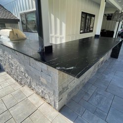 Lion Stoneworks - Beautiful modern outdoor kitchen with soapstone countertops