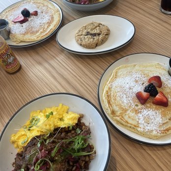 Dish Society - Brisket & Eggs over skillet potatoes, 1 pancake on the side & a chocolate chip cookie. - Southern Near Me - Austin, Texas