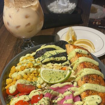 Zeke's Kitchen & Bar - Haitian Cremas is the drink. Food is the Djon Djon bowl with salmon. Also got yucca frites as an appetizer. - New American Near Me - Smyrna, Georgia