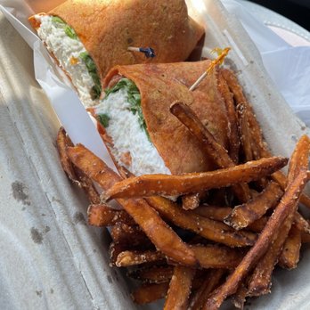 The Collective Cafe - Chicken salad wrap (on tomato wrap) with sweet potato fries: GET IT! - Cafes Near Me - Matthews, North Carolina The Collective Cafe - Chicken salad wrap (on tomato wrap) with sweet potato fries: GET IT! - Cafes Near Me - Matthews, North Carolina