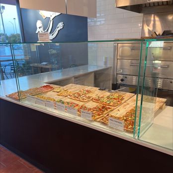 Champion Pizza - Pizza by the slice - Pizza Near Me - College Station, Texas Champion Pizza - Pizza by the slice - Pizza Near Me - College Station, Texas