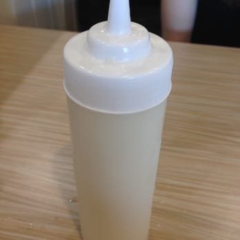 Stacks Pancake House - squirt bottle of coconut syrup - Breakfast & Brunch Near Me - Irvine, California Stacks Pancake House - squirt bottle of coconut syrup - Breakfast & Brunch Near Me - Irvine, California