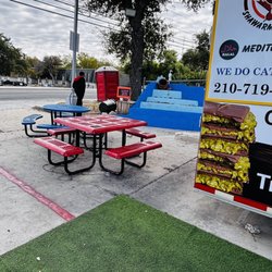 King Of Shawarma And Kabab - Seating area to the left of the truck