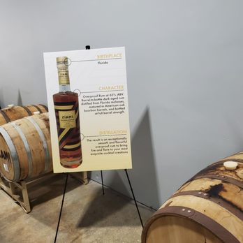 Ziami Distillery - a display of barrels and a sign - Distilleries Near Me - Hollywood, Florida Ziami Distillery - a display of barrels and a sign - Distilleries Near Me - Hollywood, Florida