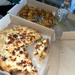Chicken bacon ranch pizza with buffalo sauce and lemon pepper fries Chicken bacon ranch pizza with buffalo sauce and lemon pepper fries