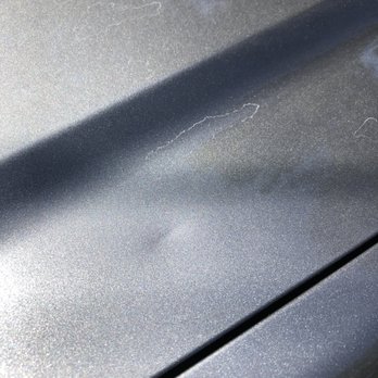 Dentezout - The crease doesn't show as severe as it was - Mobile Dent Repair Near Me