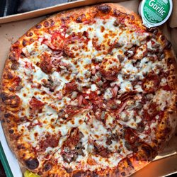 Papa Johns Pizza - We ordered a large "The Meats" with extra sauce pizza. So delicious.