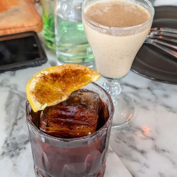 Otto’s High Dive - Arturo Fuente - reposado mezcal, Tuscan amaro, Madeira, coffee, tobacco - Cocktail Bars Near Me - Orlando, Florida Otto’s High Dive - Arturo Fuente - reposado mezcal, Tuscan amaro, Madeira, coffee, tobacco - Cocktail Bars Near Me - Orlando, Florida