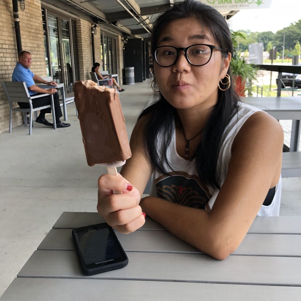 MEMPops - Sister with her banana Nutella popsicle dipped in milk chocolate! - Desserts Near Me - Memphis, Tennessee MEMPops - Sister with her banana Nutella popsicle dipped in milk chocolate! - Desserts Near Me - Memphis, Tennessee