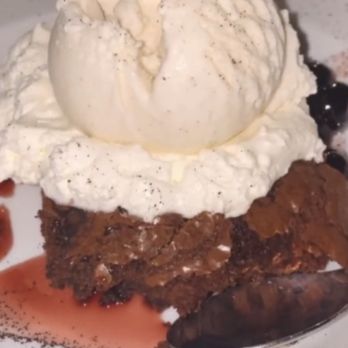 Quanto Basta - Brownie with vanilla ice cream for dessert. SO GOOD - Italian Near Me - Wilmington, North Carolina Quanto Basta - Brownie with vanilla ice cream for dessert. SO GOOD - Italian Near Me - Wilmington, North Carolina